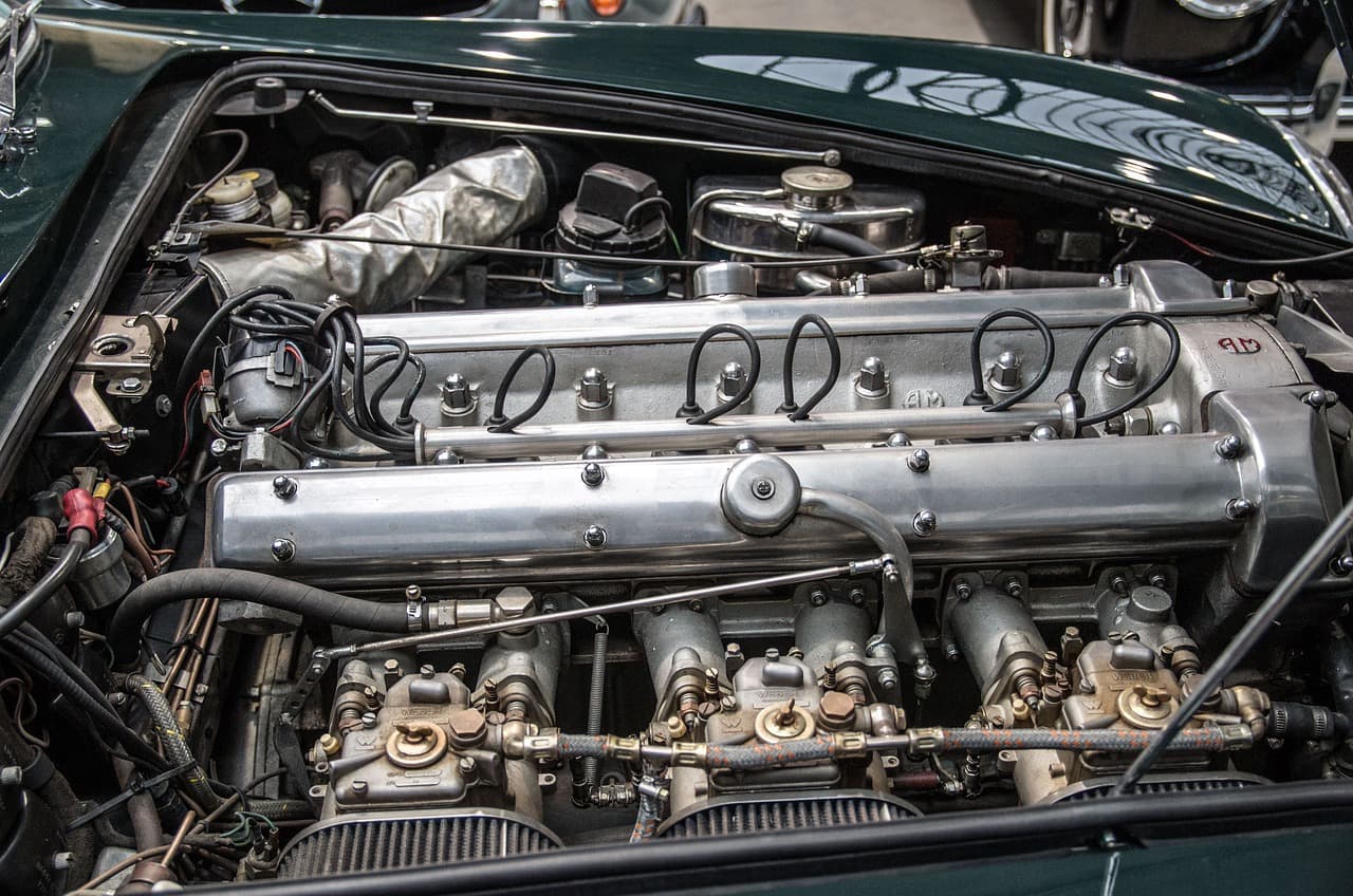 A classic straight-six engine under an open bonnet